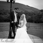 Copyright Tim Hensel photographer in Kent  bride and groom black and white bride sitting in chair