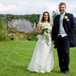 Bride and groom in countryside white trailing bouquet Tim Hensel photographer in Kent