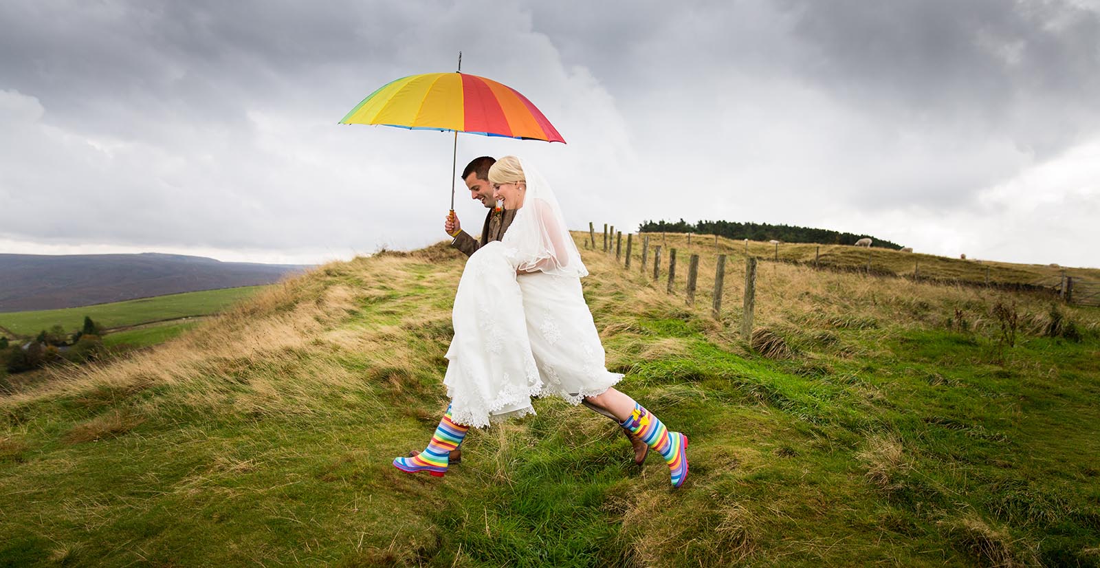 A bride at her wedding in wellington boots in cheshire