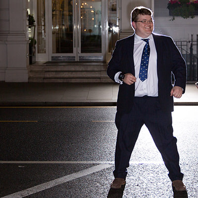 Kent wedding photographer backup man in suit smiling