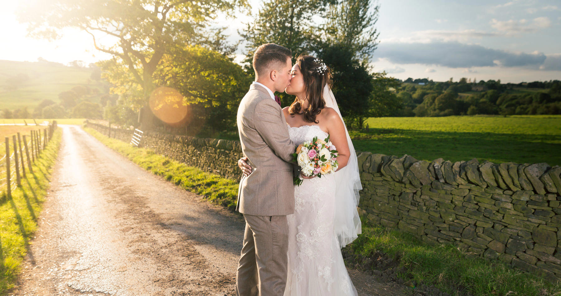 Couple kissing taken by wedding photographer in Kent